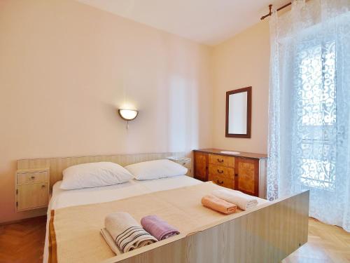 Apartments with parking space Palit, Rab - 17881