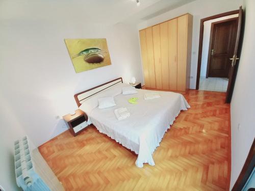 Postel nebo postele na pokoji v ubytování Apartments with WiFi Pula - 17913