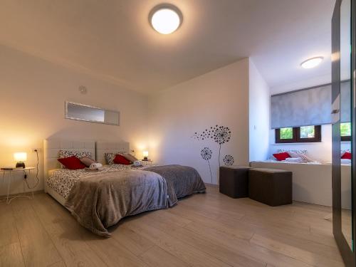 Katil atau katil-katil dalam bilik di Family friendly apartments with a swimming pool Roc, Central Istria - Sredisnja Istra - 17942