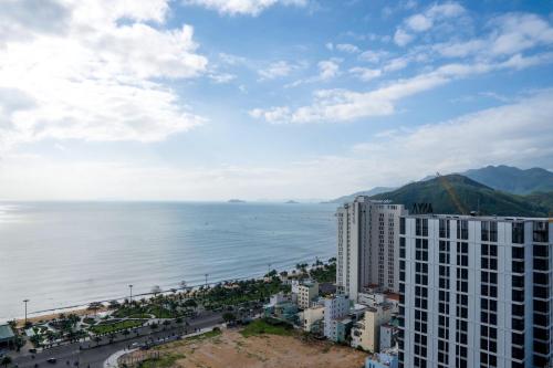a view of the ocean from a building at Q House- FLC Sea Tower in Quy Nhon