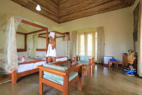 Postel nebo postele na pokoji v ubytování Mezena Resort & SPA