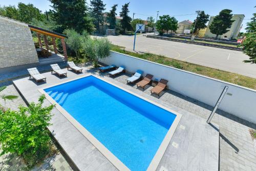 Family-friendly apartments with swimming pool Zadar - 18098