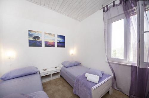 Apartments by the sea Kanica, Rogoznica - 18134