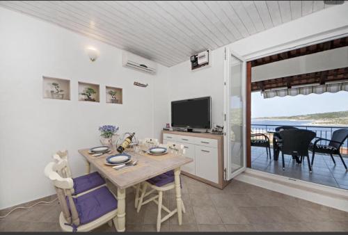 Apartments by the sea Kanica, Rogoznica - 18134