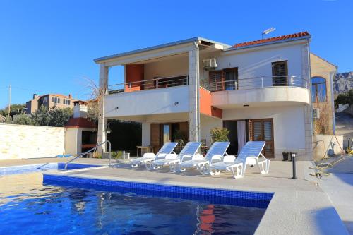 Fotografia z galérie ubytovania Apartments with a swimming pool Zrnovnica, Split - 18147 v destinácii Žrnovnica