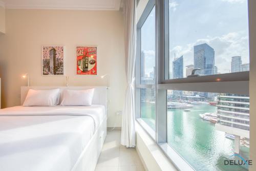 Postel nebo postele na pokoji v ubytování Pristine 1BR in Bay Central Dubai Marina by Deluxe Holiday Homes