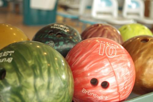 a bunch of different colored bowling balls with a face on them at Karuizawa Prince Hotel West in Karuizawa