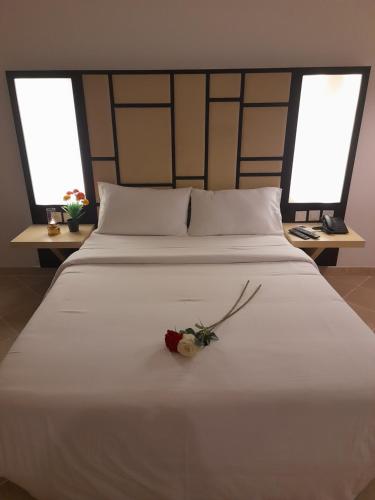 Кровать или кровати в номере HÔTEL DE LA MEDINA