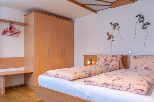 Postel nebo postele na pokoji v ubytování Haus Mandl