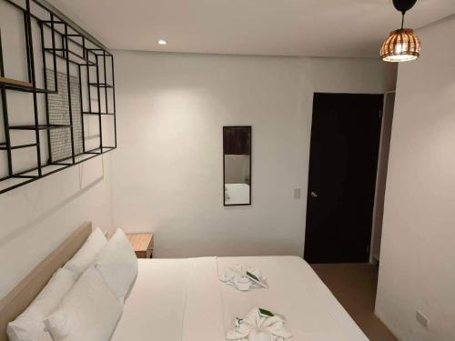 Postel nebo postele na pokoji v ubytování Hotel Rupert A Baler