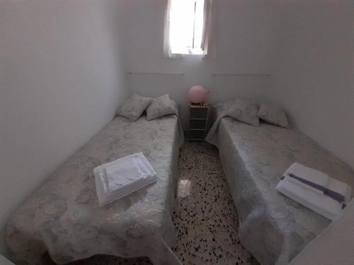 Katil atau katil-katil dalam bilik di La mia Dimora