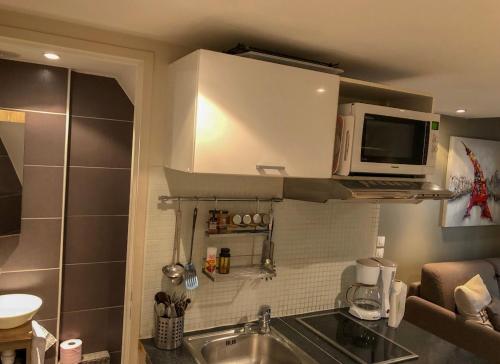 Virtuvė arba virtuvėlė apgyvendinimo įstaigoje Appartement BASTILLE/MARAIS Gare Lyon