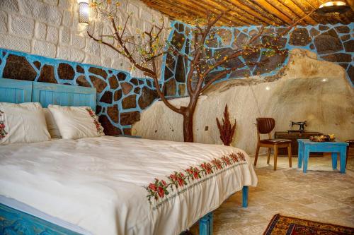 Postel nebo postele na pokoji v ubytování Aşk-ı Nare Cave Hotel - Swimming Pool & SPA
