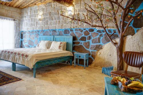 Aşk-ı Nare Cave Hotel - Swimming Pool & SPAにあるベッド