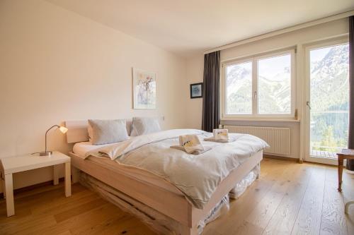 Postel nebo postele na pokoji v ubytování Viktoria B42 by Arosa Holiday