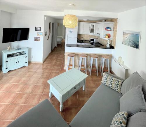 Et tv og/eller underholdning på Salitre Ocean Sunset