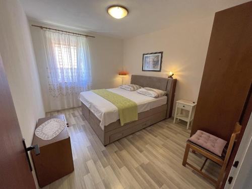 Postel nebo postele na pokoji v ubytování House Lara