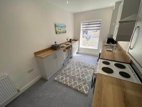 Kuchyň nebo kuchyňský kout v ubytování Blackpool Abode - Silver Sands
