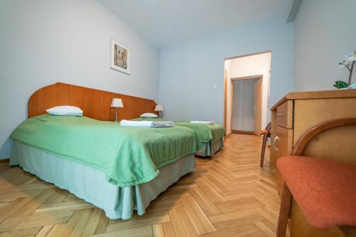 Katil atau katil-katil dalam bilik di Ośrodek Taira i Leliwa