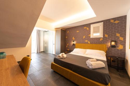 Katil atau katil-katil dalam bilik di Villa Totò Resort