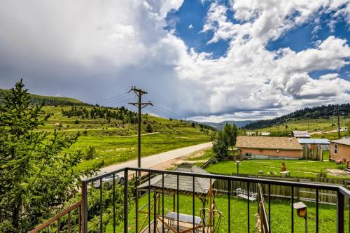 a view from the balcony of a farm house with a road at The Conductor's House in Cripple Creek