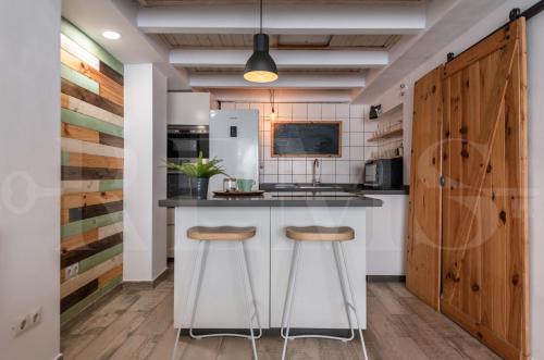 Bright duplex loft next to the city center by REMS
