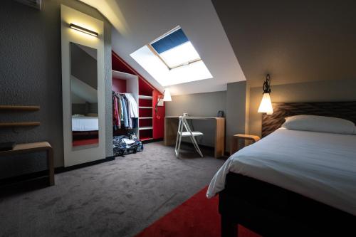 Ein Bett oder Betten in einem Zimmer der Unterkunft ibis Montargis