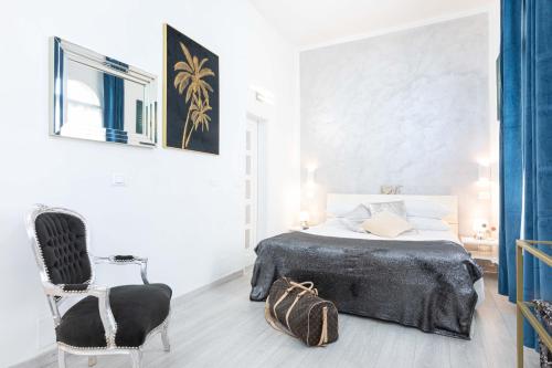 A bed or beds in a room at Trastevere Blue King Studio Suite - Top Collection