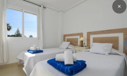 Llit o llits en una habitació de Elia-Apartment nur 3 Minuten zum Strand