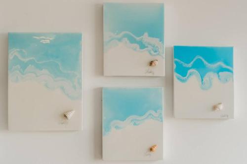 a group of four cards with drawings of clouds at ☆Brand new 2BR PH by CASA PARAISO☆ in Cancún