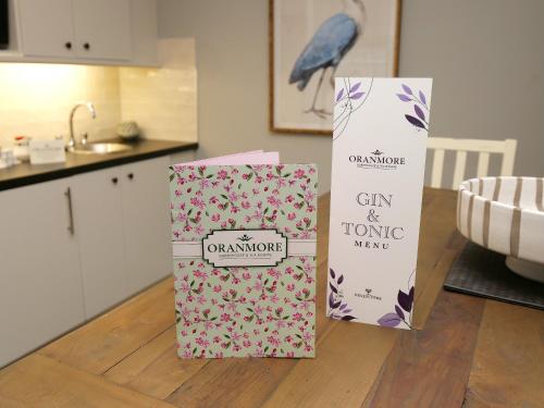 two boxes sitting on a table in a kitchen at Oranmore in Ballymena