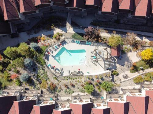 an overhead view of a pool at a resort at The Castle at Swan Lake in Vernon
