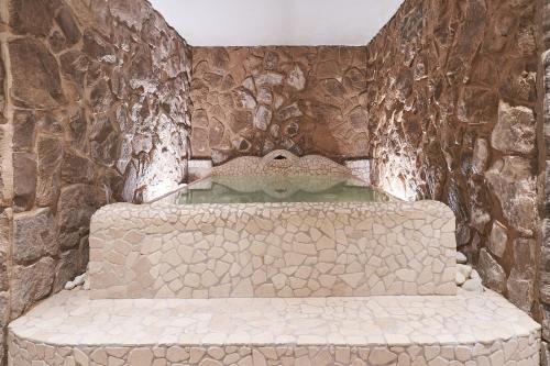 Ένα ή περισσότερα κρεβάτια σε δωμάτιο στο Hotel Dolomiti - Azzurro Club
