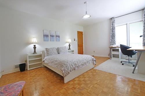 Postel nebo postele na pokoji v ubytování Grand Villa Estate