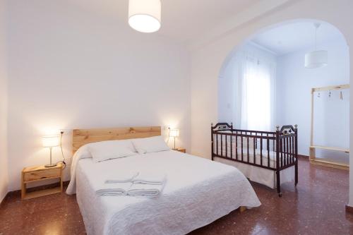 Posteľ alebo postele v izbe v ubytovaní Precioso y luminoso apartamento Calle Corredera. Casco Histórico