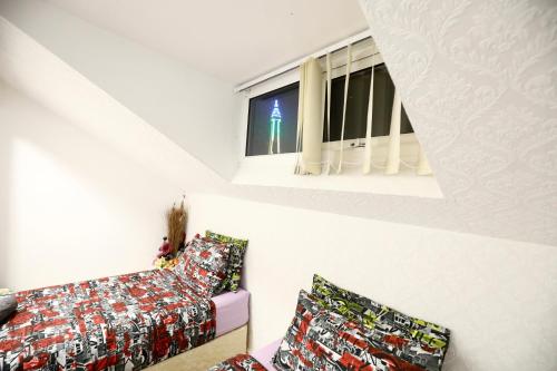 Ένα ή περισσότερα κρεβάτια σε δωμάτιο στο Blackpool Central Hotel