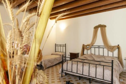 a bedroom with two beds in a room at Affittacamere Cà Marcello in Monselice