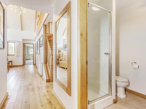 a bathroom with a shower and a toilet at Askival in Elgol