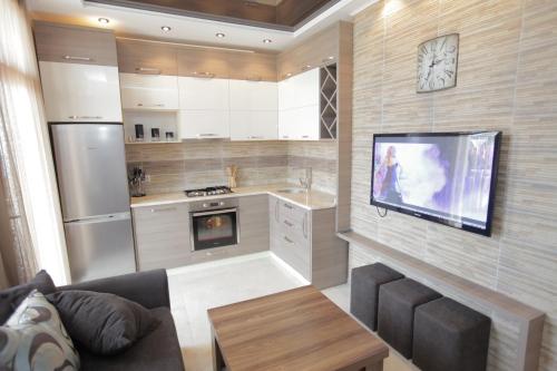 Η κουζίνα ή μικρή κουζίνα στο Apartment with Summer Terrace