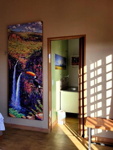TV a/nebo společenská místnost v ubytování Atelier & Pousada Chapada