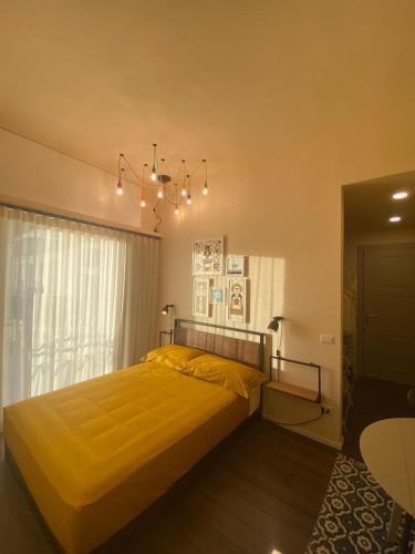 Postel nebo postele na pokoji v ubytování a casa di Ma & Giò