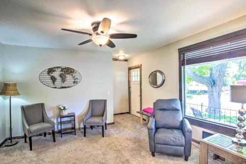 a living room with chairs and a ceiling fan at Appleton Abode Near Lake Winnebago and Downtown in Appleton