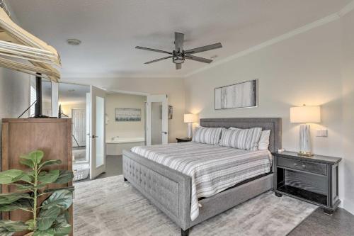 a bedroom with a bed and a ceiling fan at Lovely Lehi Retreat 27 Mi to Alta Ski Area! in Lehi