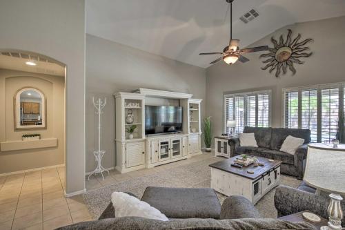 a living room with a couch and a tv at Pool, Hot Tub and Patio Mesa Oasis Desert Getaway in Mesa