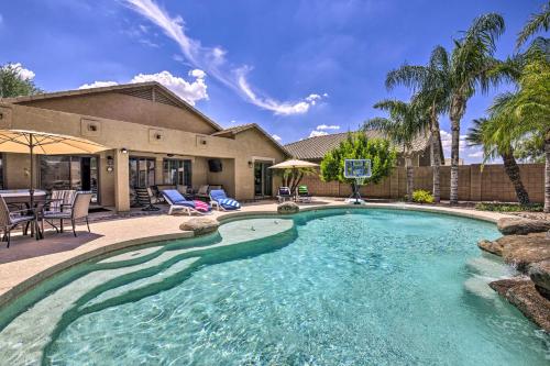 a swimming pool in front of a house at Pool, Hot Tub and Patio Mesa Oasis Desert Getaway in Mesa
