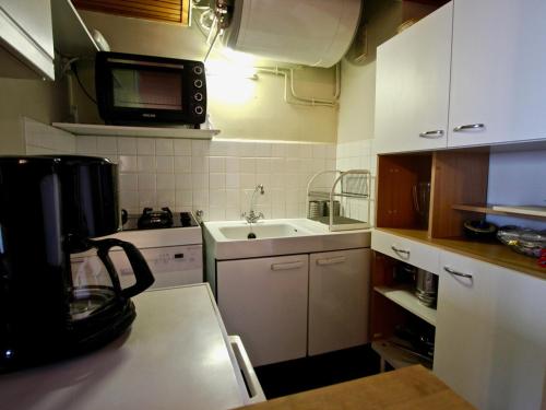 Nhà bếp/bếp nhỏ tại Appartement Chamrousse, 3 pièces, 8 personnes - FR-1-549-108