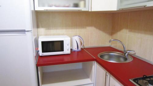 Ett kök eller pentry på Studio apartment Zaporozhye