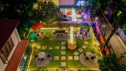an overhead view of a garden with umbrellas and tables at Hotel Blue Horizon in Kathmandu
