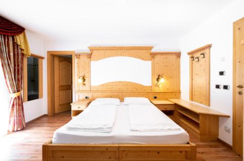 Katil atau katil-katil dalam bilik di Garni Hotel and Apartments Wildbach