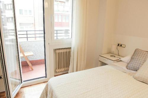 Ένα ή περισσότερα κρεβάτια σε δωμάτιο στο APARTAMENTO BARRIO DE LA ARENA